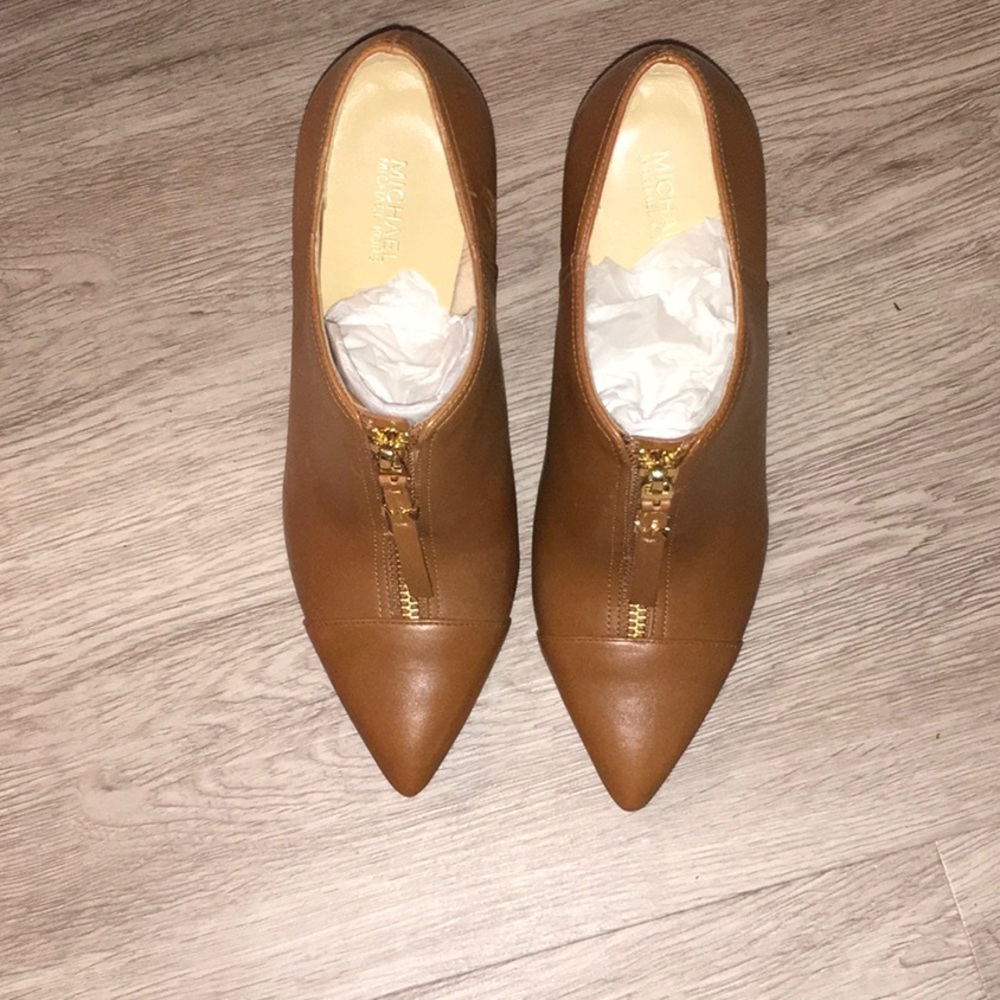 Brand new Michael Kors Booties, size 6!